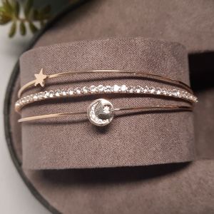 Gold Tone Cubic Zirconia Bracelet Star Moon Memory Wire